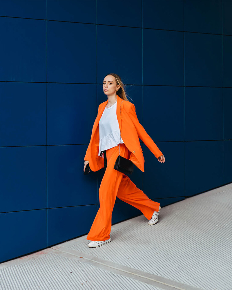 Woman in orange suit